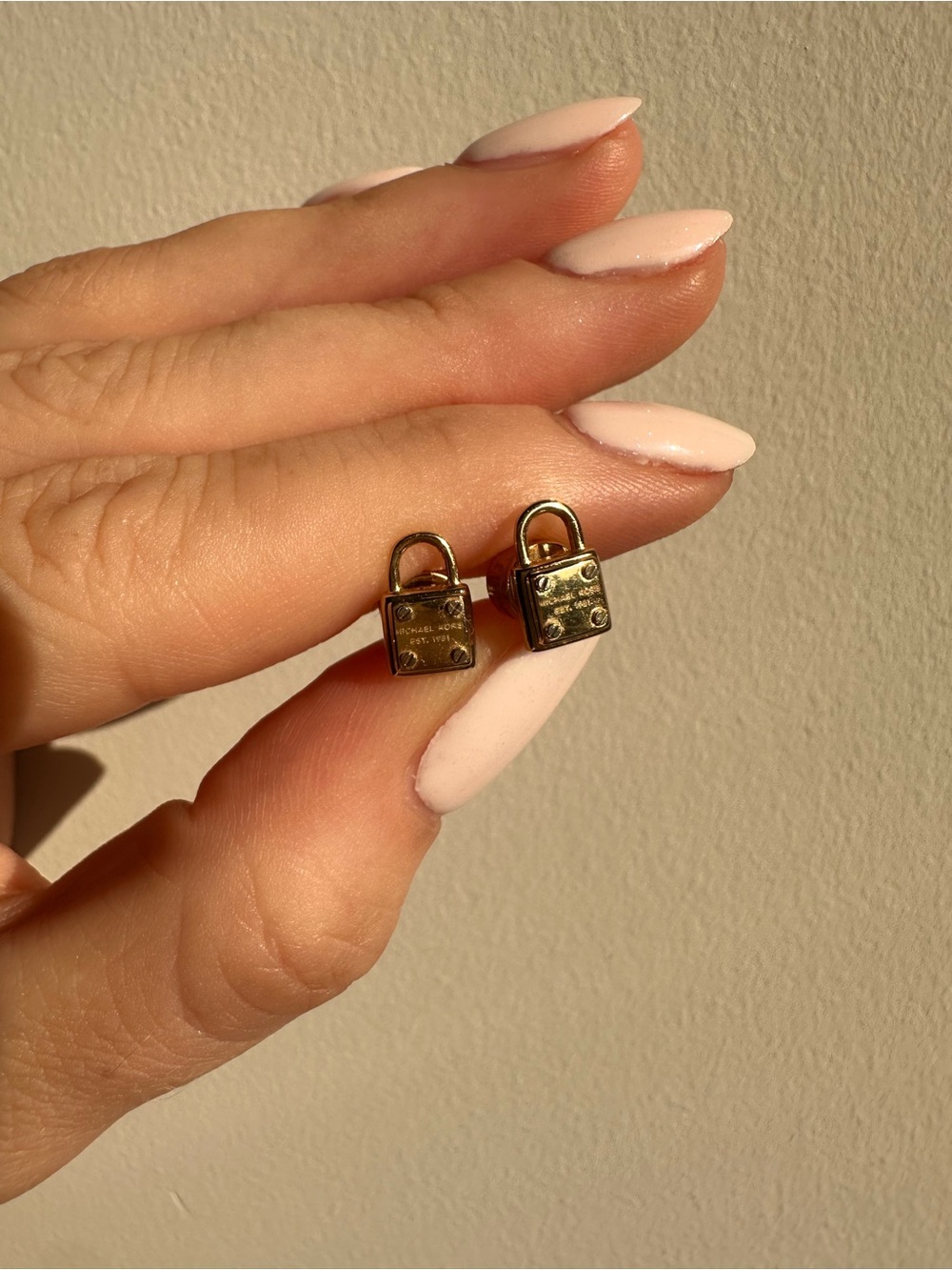 Michael Kors gold lock studs earrings